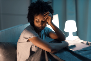 a person struggles with a headache after taking a dangerous medication mixture