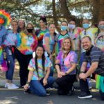 group-posing-with-colorful-shirts