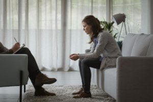 a person speaks with a therapist about Drug rehabs
