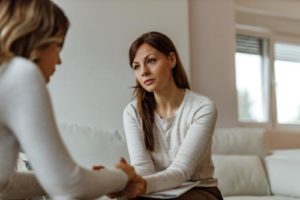 a person talks to a therapist in a valium addiction treatment program
