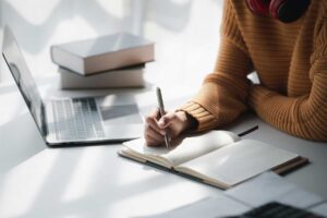 a person takes notes, possibly regarding the question what are study drugs?