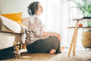 a person meditates, one of the activities to help combat depression