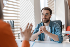 a patient listens while a therapist asks "is cognitive-behavioral therapy right for you?"