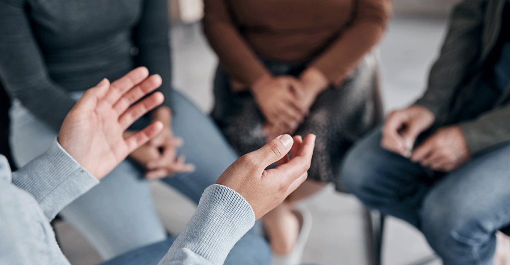 a group discusses who can benefit from group therapy