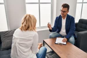 a provider talks with a patient about when vivitrol treatment is needed